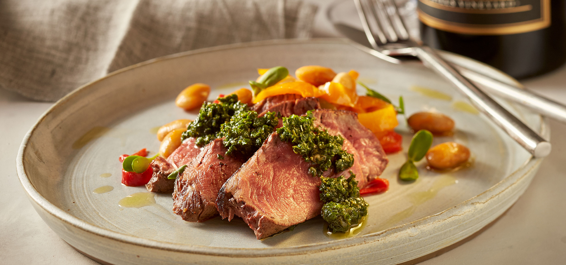 Grilled Filet Mignon with Chimichurri and a Corona Bean and Summer Pepper Ragout