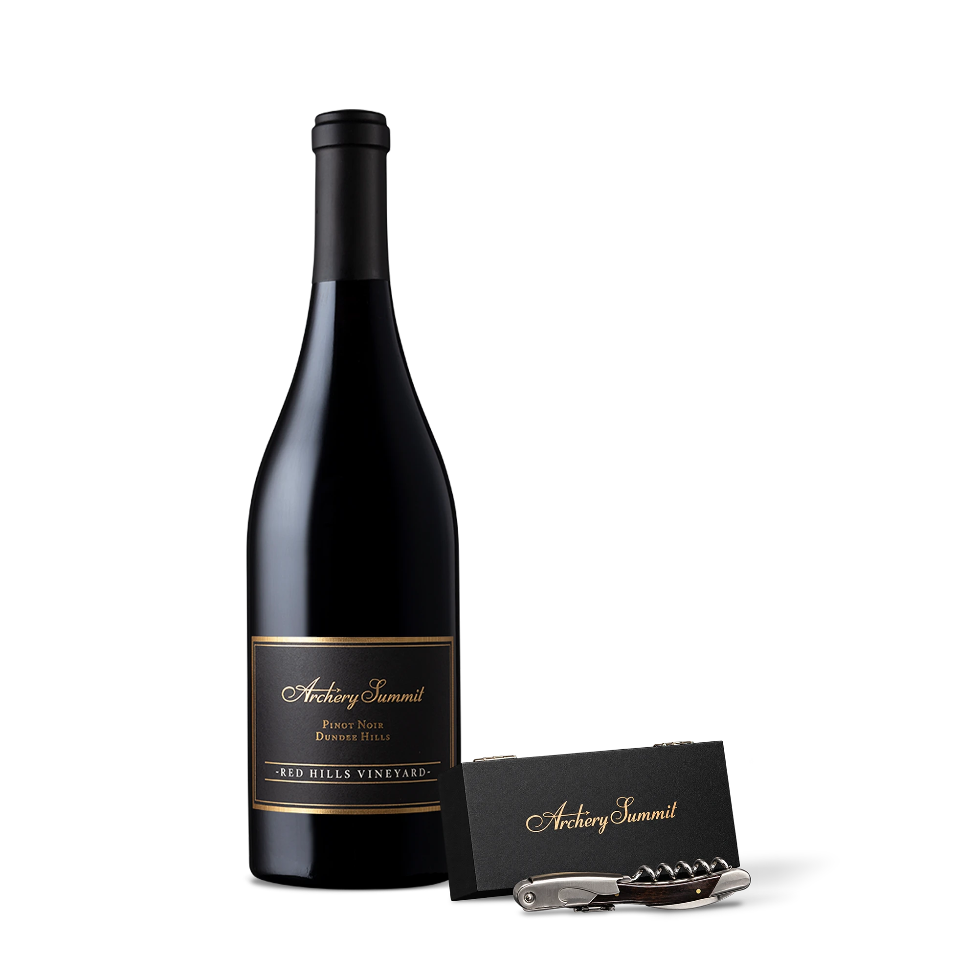 A bottle of Archery Summit Pinot Noir wine stands next to a corkscrew and a black card with gold text, all set against a plain white background.